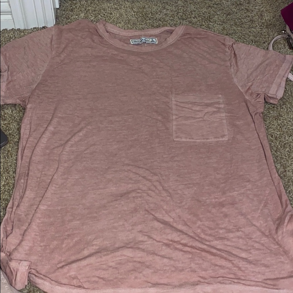 Distressed peachy color tee